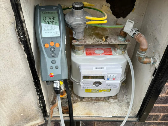 Gas meter and pipework checked during a gas safety inspection