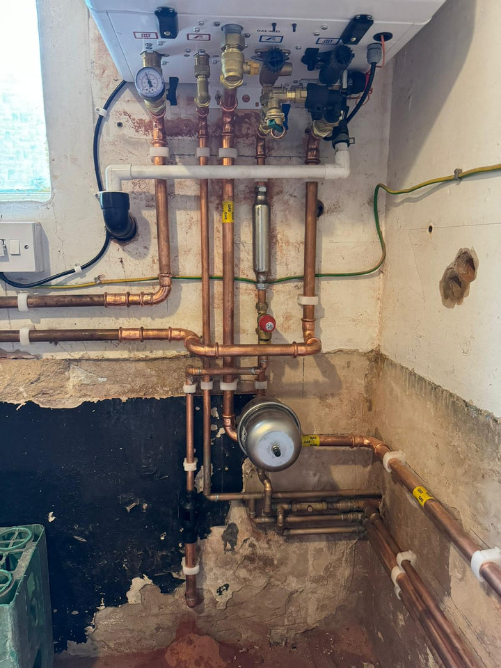 Heating manifold with pressure gauges installed and balanced
