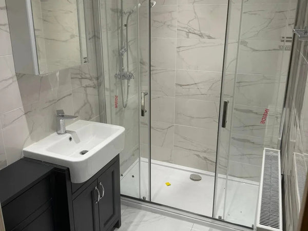Sliding shower and vanity