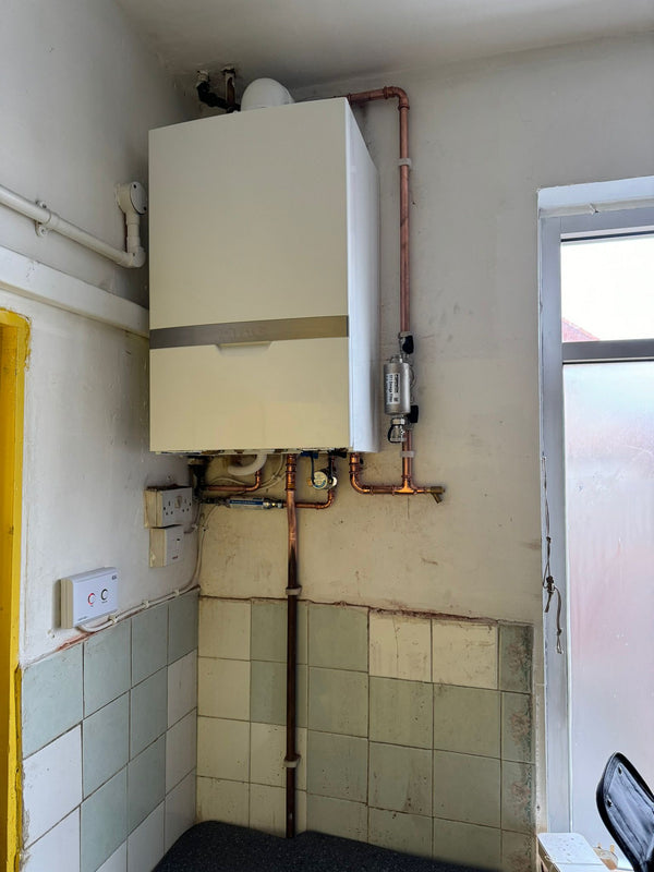 Combi and pipework in a kitchen