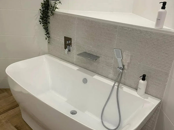 Freestanding bath, plumbed in