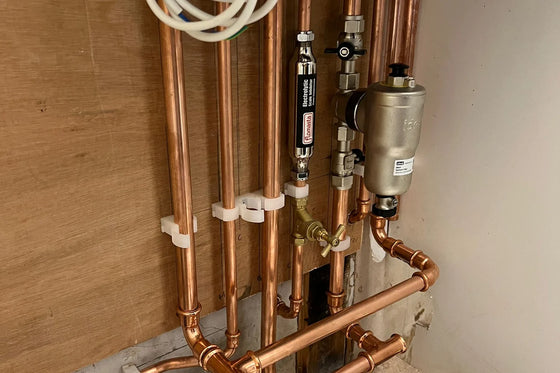 New copper pipework run to a newly installed boiler